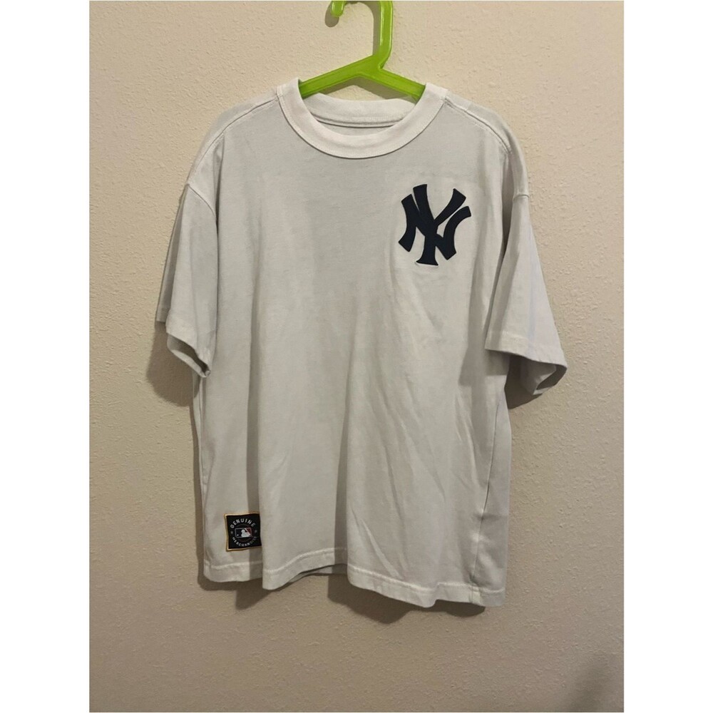 Genuine Merchandise White Short-Sleeve T-Shirt with Navy Logo